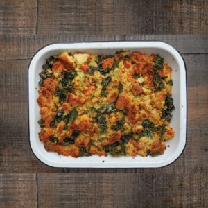 cornbread stuffing in a white casserole dish