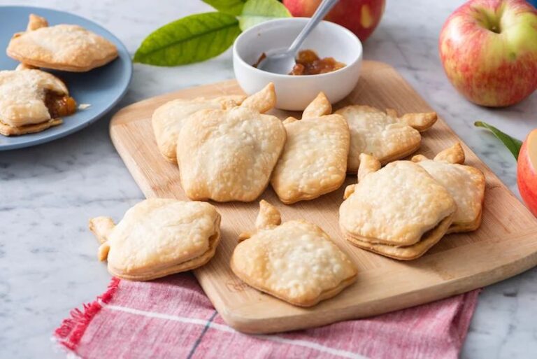 Apple-shaped turnovers with ice cream and diced apples