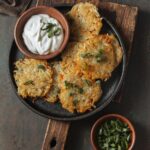 Carrot parsnip latkes with sour cream and herbs