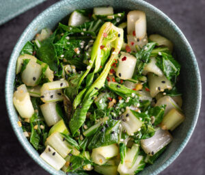 Sautéed baby bok choy with garlic in a bowl