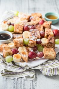 French toast cubes on skewers with grapes and banana