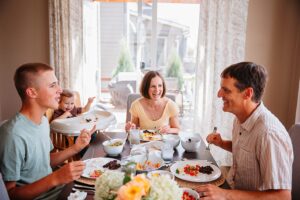 Ann Kent and her family at the dinner table