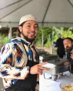 Chef Jeremy Thunderbird at a buffet station
