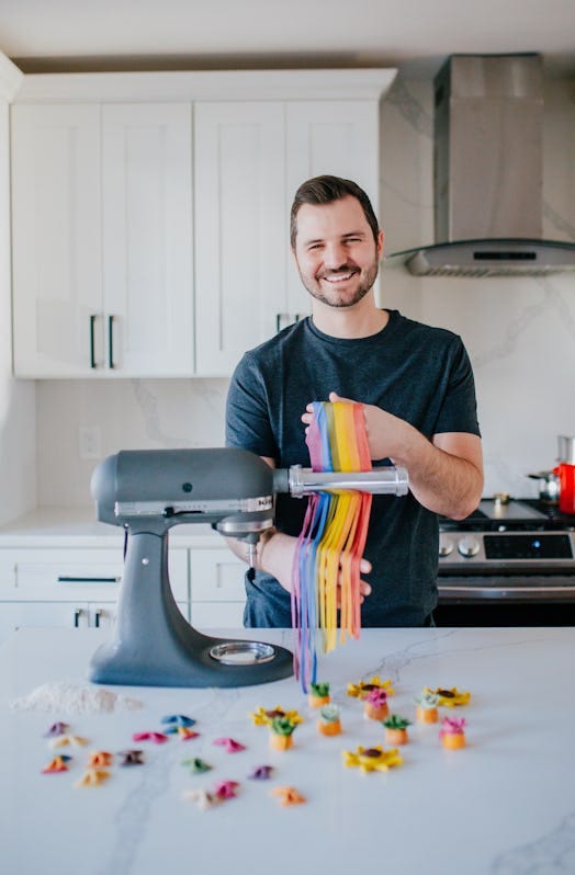 Danny Freeman in his kitchen make rainbow colored homemade pasta