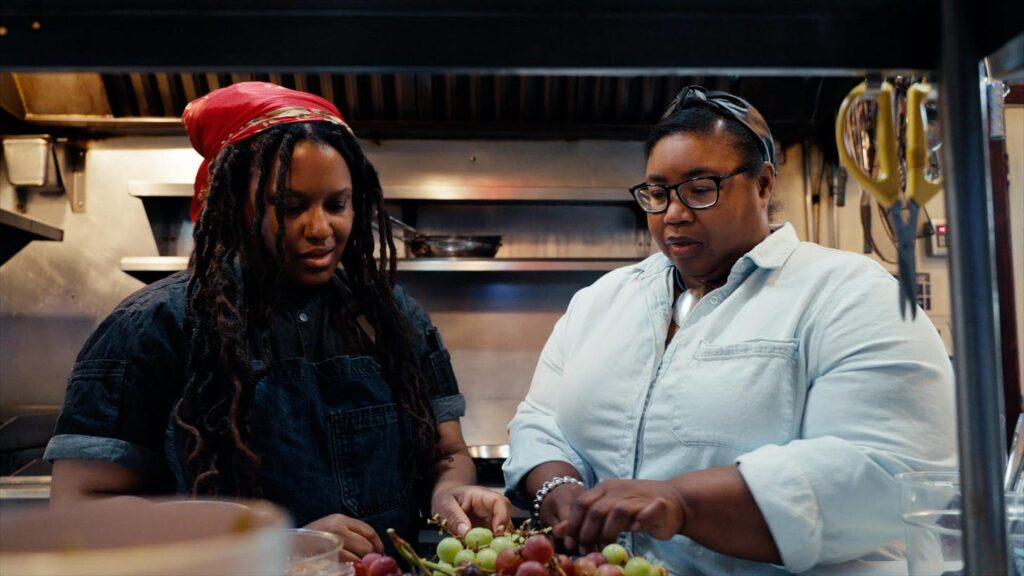Two Black women in a commercial kitchen