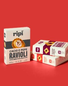 3 boxes of Ripi ravioli on a red background