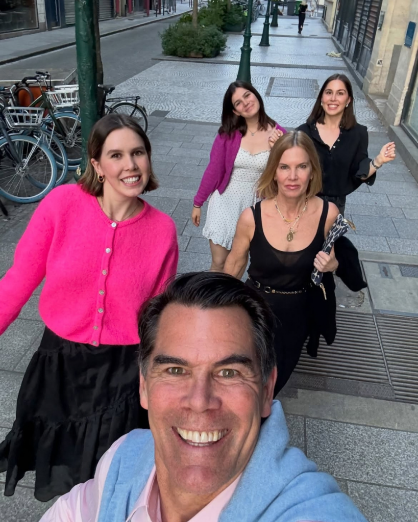 Katie Morford with her husband and their three grown daughters on a city street