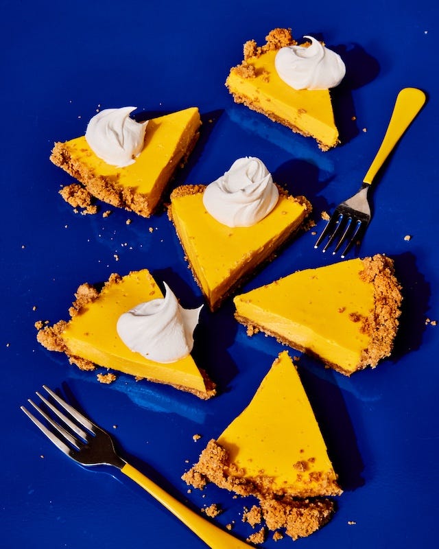 Slices of mango pie with whipped cream, from Amrikan