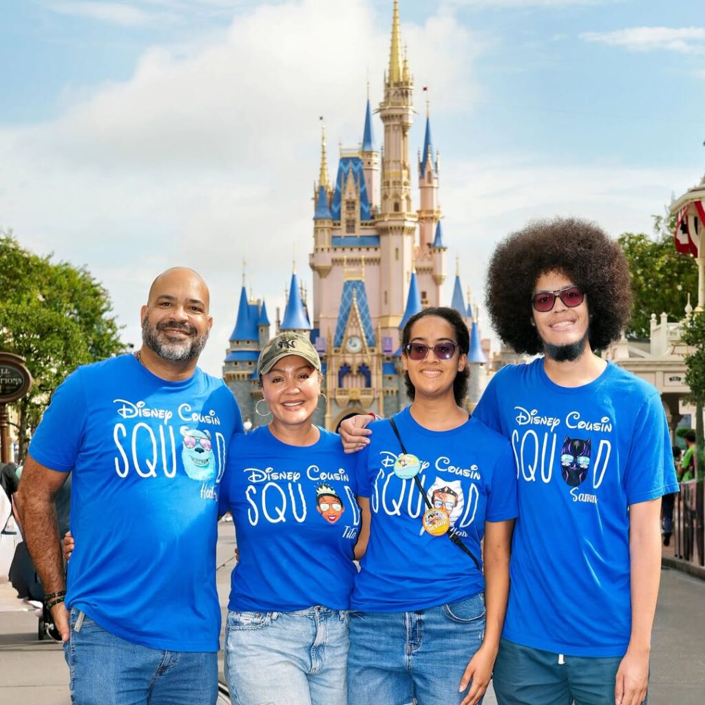 Marta with husband and kids at Disney World