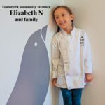 Elizabeth N, a One Potato featured community member, in a chef's coat