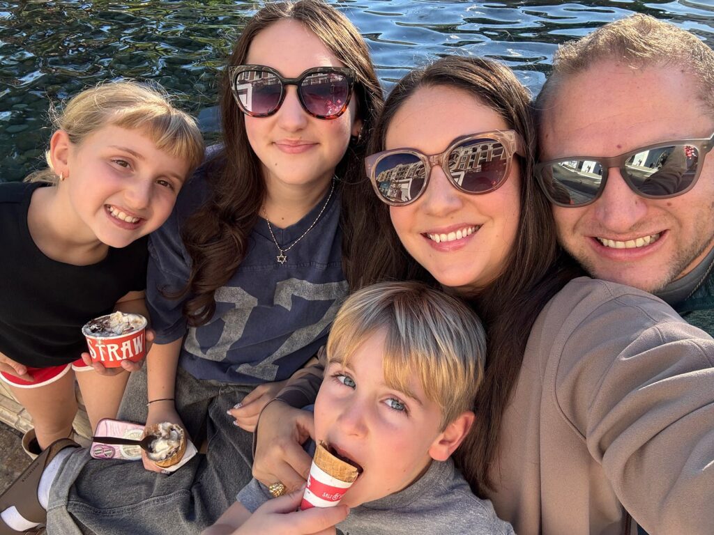 Shannon and her whole family having ice cream at the lake