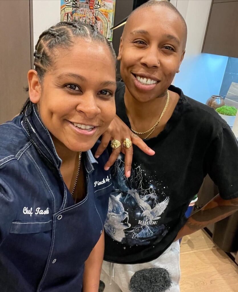 Chef Tashia standing and smiling with @lenawaithe