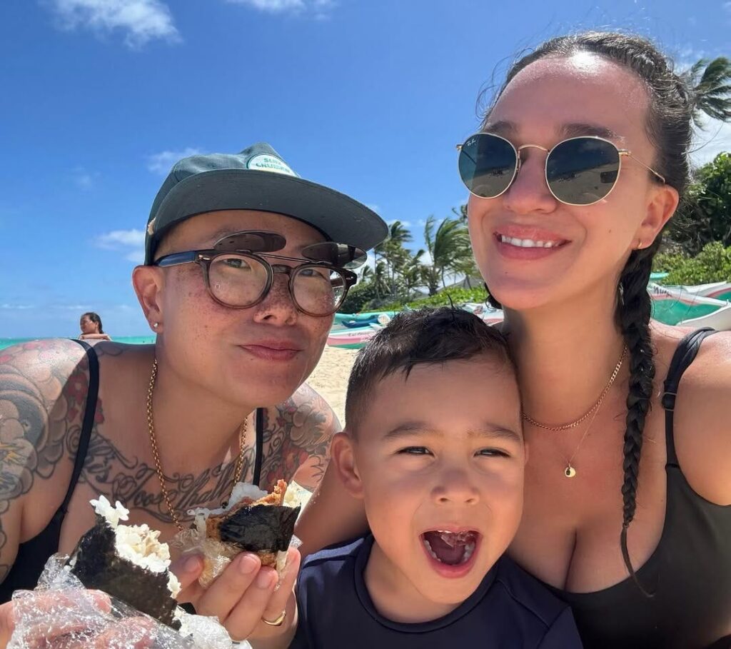 Chef Tatiana Rosana with her family at the beach, eating rice balls